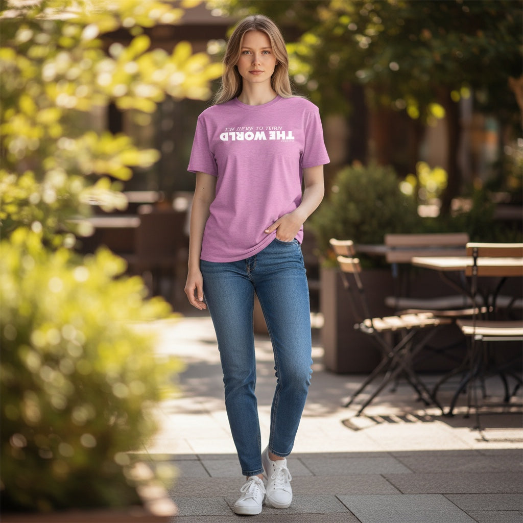 Holy and Royal I'm Here To Turn The World T-Shirt with Acts 17:6. Pink cotton tee with white lettering.